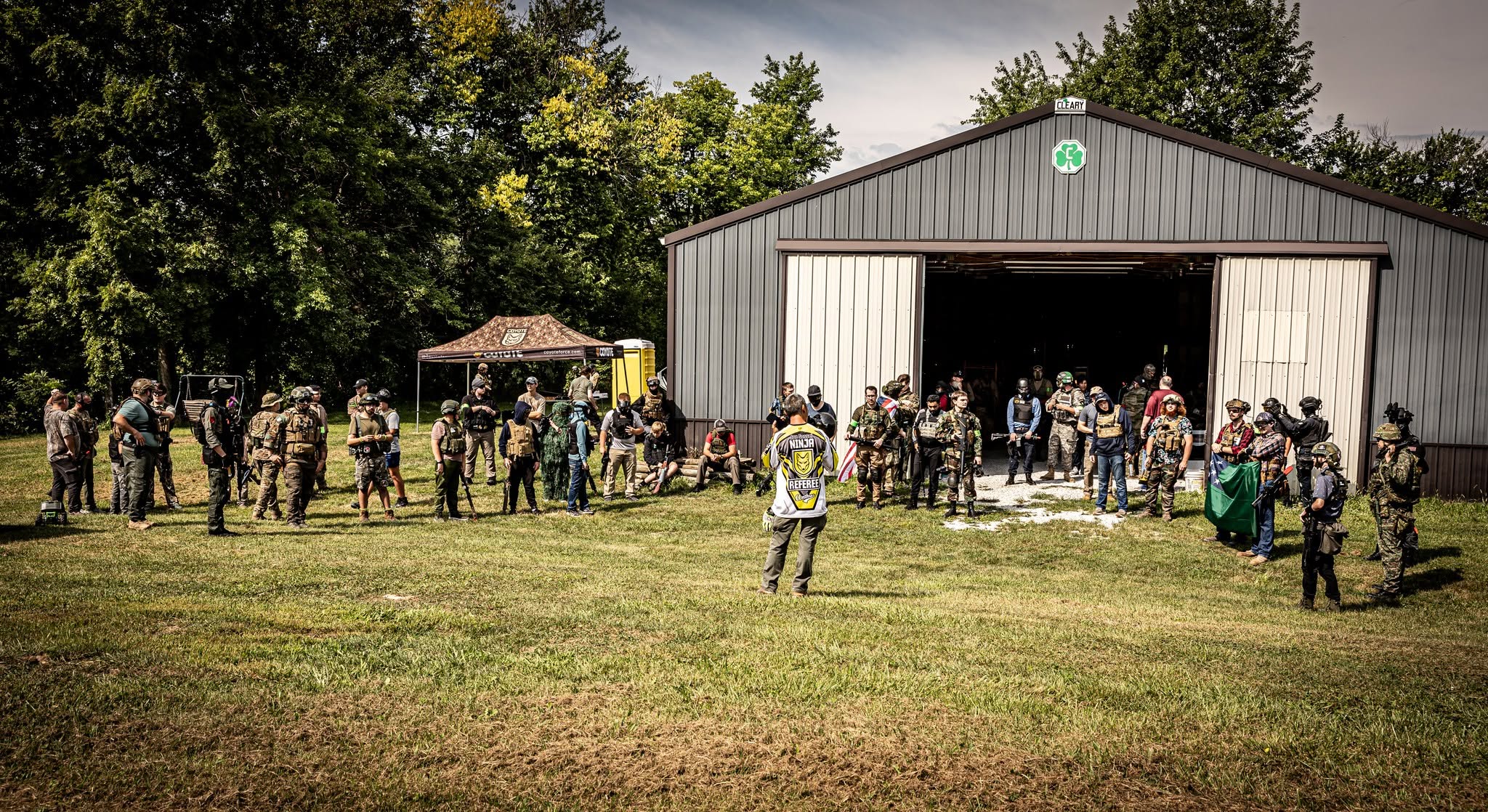 Airsoft briefing outside the field barn
